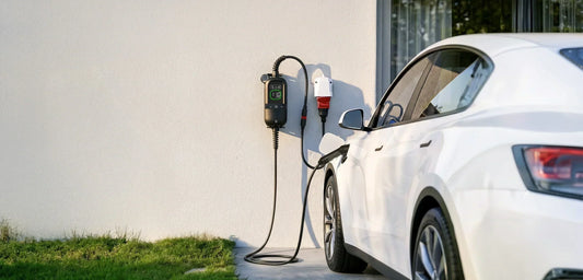 A electric vehicle is charged with a rheidon PC200 pro charger in a modern house 