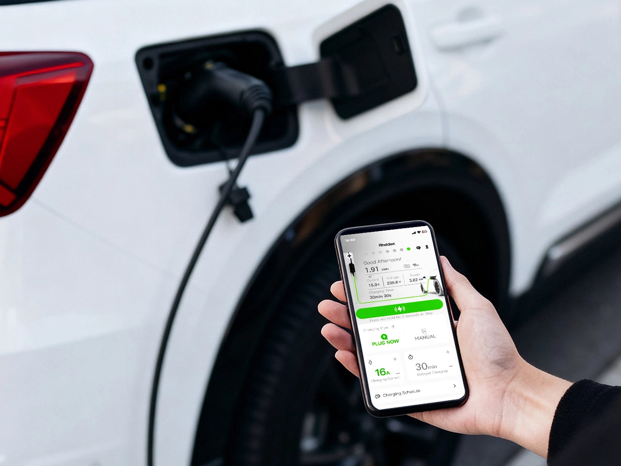 Rheidon smart app interface on a mobile phone showing real-time charging status, energy data, and settings, with an EV being charged in the background.